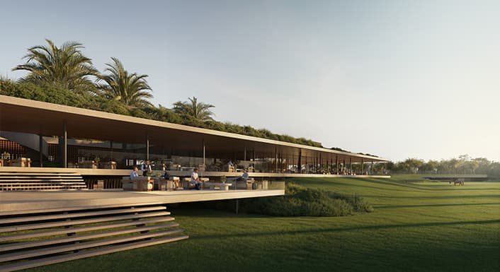 The Grand Polo Club & Resort clubhouse exterior, terraced above the polo fields