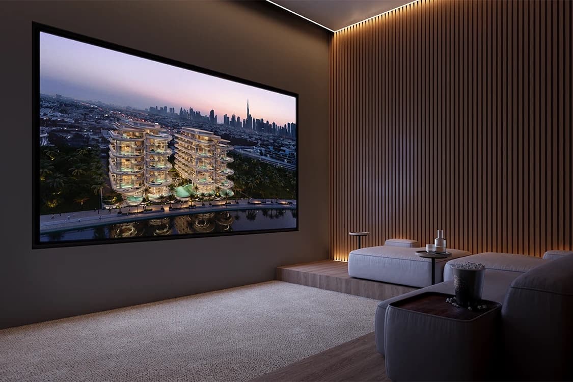 Home cinema room with a projection of the building's exterior on screen