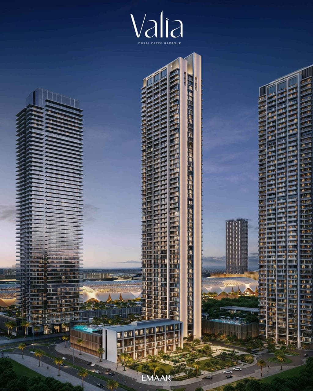 Valia tower rising from its podium at dusk, flanked by neighbouring Dubai Creek Harbour towers